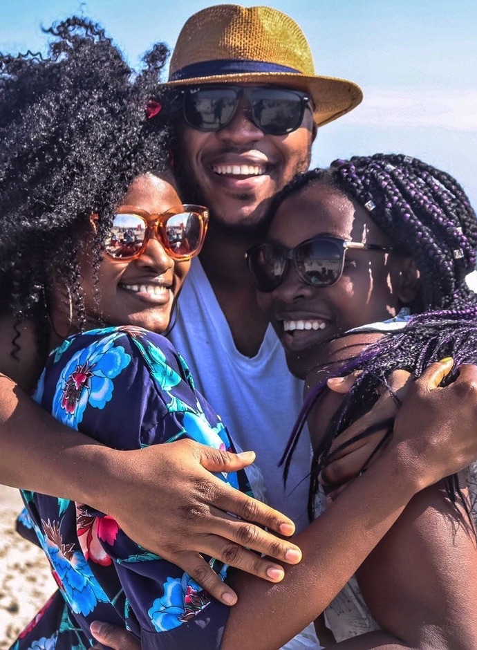 A family hugging thanks to therapy